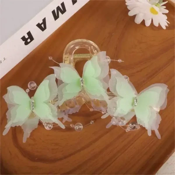 مشبك شعر بشكل فراشة شفافة