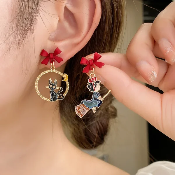 أقراط كرتونية على شكل قطة وفتاة