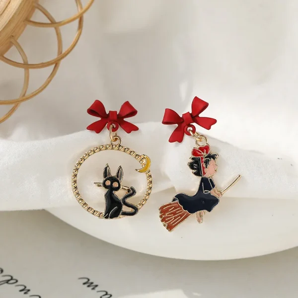 أقراط كرتونية على شكل قطة وفتاة