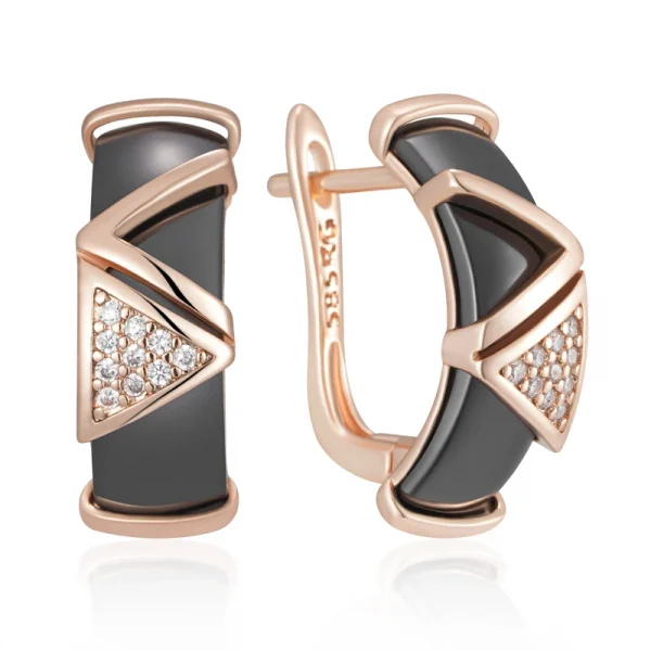 اقراط ذهبية ذات شكل هندسي باللون الاسود