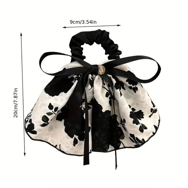 ربطة شعر على شكل فيونكه أنيقه