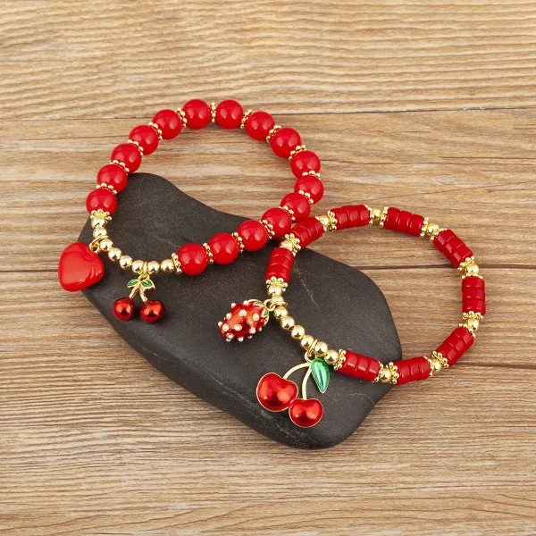 سوار من Nidin بتصميم على شكل الكرز والقلب مع خرز أحمر
