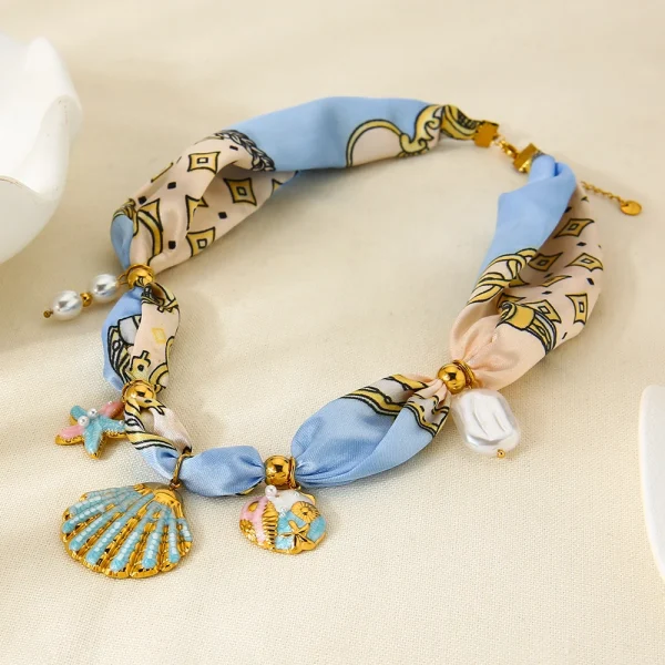 عقد نسائي من INS على طراز المحيط، مزين بتعليقة نجمة بحر وصدفة مطلية بالمينا الملون