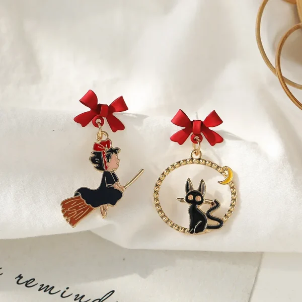 أقراط كرتونية على شكل قطة وفتاة