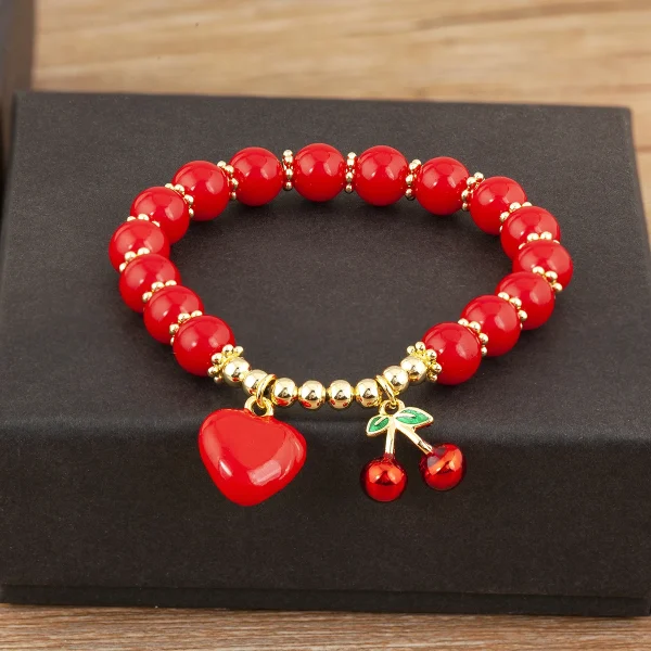 سوار من Nidin بتصميم على شكل الكرز والقلب مع خرز أحمر