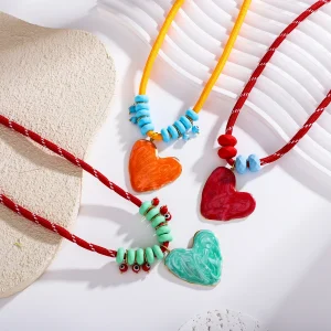 عقد عصري جديد من حبل القطن مع قلادة قلب من الفولاذ المقاوم للصدأ