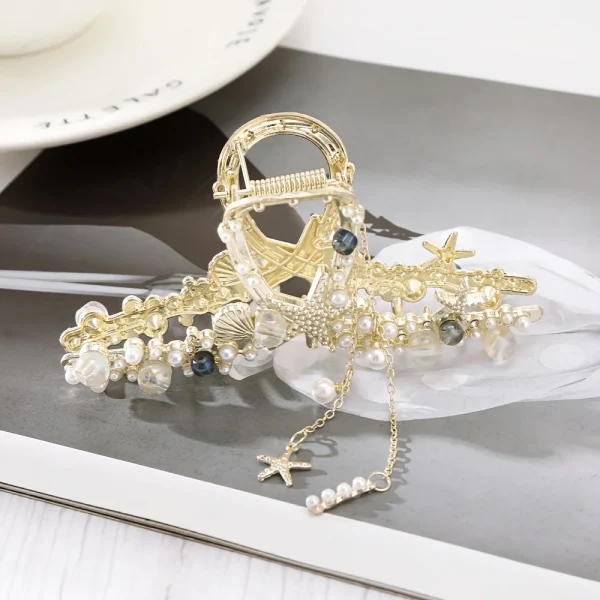 مشبك شعر من  *Haimeikang*  مزين بعرق اللؤلؤ و صدفة ونجم البحر