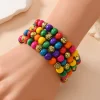 سوار متعدد الطبقات مصنوع يدويًا من خرز خشبي ملوّن