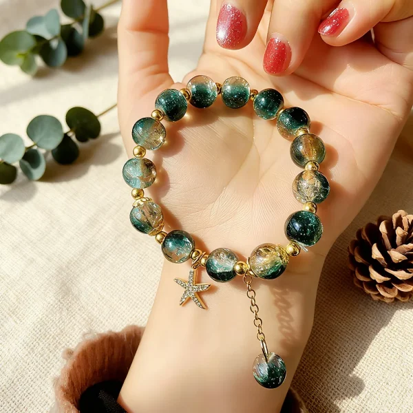 سوار مصنوع يدويًا من خرز كريستالي بتدرجات اللون الأزرق