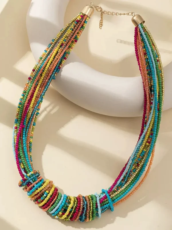 عقد نسائي بوهيمي متعدد الطبقات مصنوع من خرز الأرز الملون